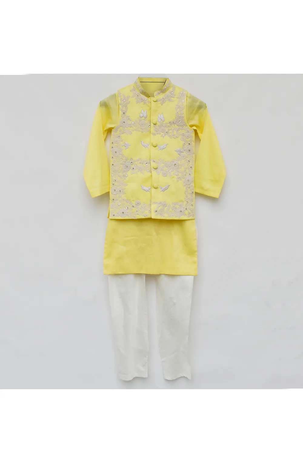 Yellow silk kurta with nehru jacket and white pyjama