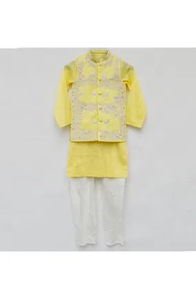 Yellow silk kurta with nehru jacket and white pyjama